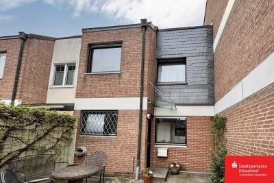Familienfreundliches Reihenmittelhaus mit Garten und Kamin in Urdenbach!