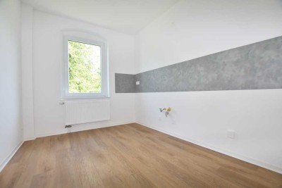 *Erstbezug nach Sanierung: hochmoderne 2-Raum-Whg. mit Balkon & Gartennutzung in 09221 Neukirchen*