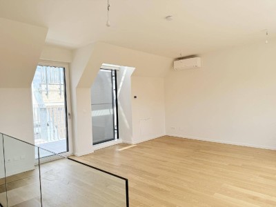 Eleganz trifft Lage – Neubau-Dachgeschosswohnung in Toplage