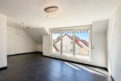 Zentral. Großzügig. Modern. 
- 3-Zimmer-Maisonettewohnung mit Balkon und 2 Tiefgaragens