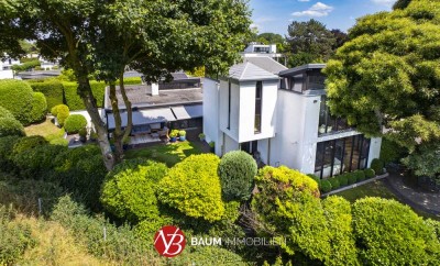 Zeitlose Villa in Rheinnähe mit außergewöhnlicher Architektur und Weitblick