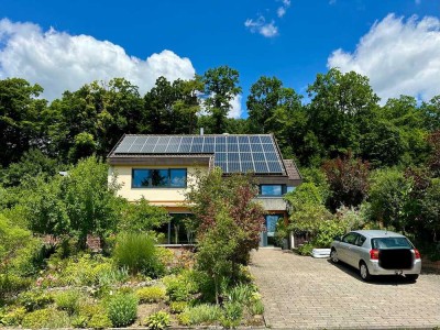 Leben im Grünen: Einfamilienhaus mit Gartenoase, Holzofen & PV-Anlage-nachhaltig und naturnah wohnen