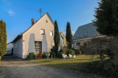 Modernisiertes 6-Zi. EFH mit Garten, Garage, Terrasse & zusätzlichem Baugrundstück in ruhiger Lage
