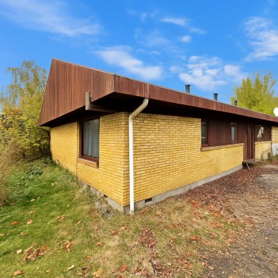 Ruhig wohnen, schnell angebunden – Haus mit Sanierungsbedarf in Tettsbüttel-Röst