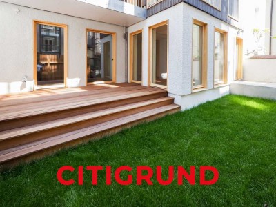 Au/Beste Raritätenlage - Stylische Neubau-Wohnung mit Gartenterrasse in energieeffizientem Stadthaus