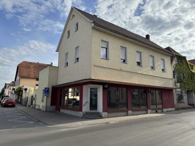 Attraktives Mehrfamilienhaus mit Ladengeschäft und Entwicklungspotenzial in begehrter Lage