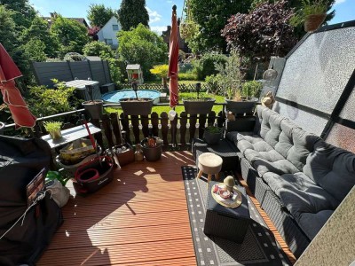 4 Erdgeschosswohnung mit Einbauküche, Doppelparkergarage und Gartennutzung!