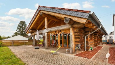 Ihr Traumhaus im Blockhausstil – Naturnahes Wohnen auf großzügigem Grundstück