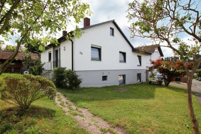Großzügiges Einfamilienhaus mit optionaler Einliegerwohnung und sonnigem Garten in ruhiger Wohnlage