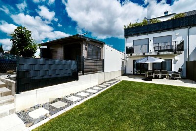 Naturnah & Exklusiv ☘️ Wie im Haus! Traumhafte 3-Zi.-EG-Wohnung | großer Garten, 2 Stellplätze!