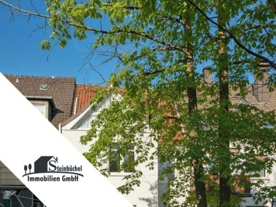 Vielseitiges Mehrfamilienhaus mit Ladeneinheit und zwei Garagen in beliebter Lage!