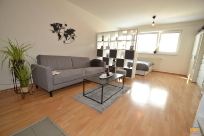 DONAUFELD: Modernes Dachgeschoß-Appartement in zentraler Lage und guter Öffi-Anbindung