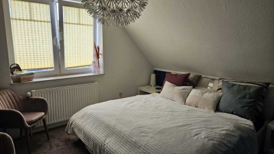 Helle 3,5-Zimmer-Wohnung mit Balkon & ausgebautem Dachgeschoss in Top-Lage