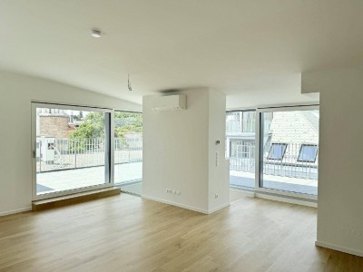 Eleganz trifft Lage – Neubau-Dachgeschosswohnung in Toplage