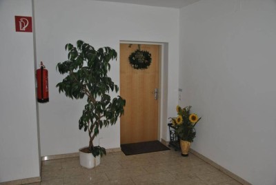 Mietwohnung mit Wintergarten und Grünfläche!
