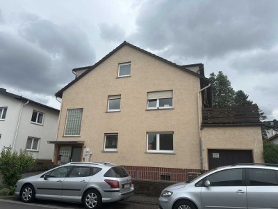 Dreifamilienhaus mit Garten, Balkon, Garage und Ausbaupotenzial in ruhiger Lage von Pohlheim-Watzen.