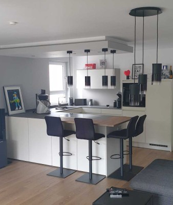3-Raum-Wohnung mit Balkon, Einbauküche und zwei Tiefgaragenstellplätzen in Bodenheim