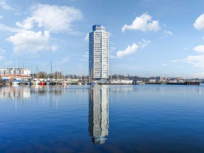 Kapitalanlage mit Ausblick: Einraumwohnung im 11. Stock mit Südbalkon