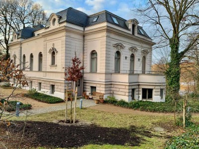 Turn-of-the-century villa with modern living style and serene lake view