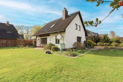 Familienidyll mit Platz zum Leben – Haus mit großem Garten, Garage und Werkstatt in Toplage