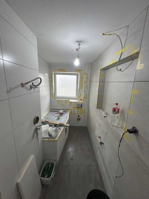 Erstbezug nach Kernsanierung: Moderne 3-Zimmer-Wohnung mit eigenem Garten und Stellplatz