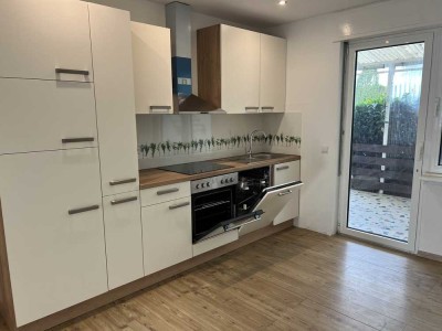 Erdgeschoss Wohnung mit Einbauküche und verträumtem Garten in ruhiger Lage in Saarlouis Neuforweiler