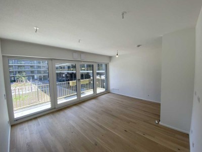 Neubau Erstbezug: Voll möblierte 1-Zimmer Wohnung mit hochwertiger EBK und tollem Balkon