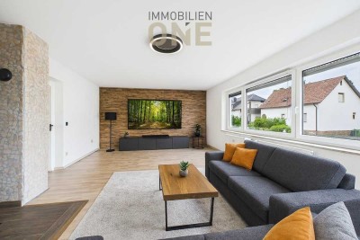 Sanierte 4-Zimmerwohnung im Hochparterre mit Garten und Garage