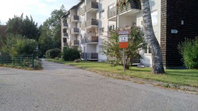 1 Zimmer-Wohnung mit Bergblick in ruhiger und idyllischer Wohnanlage mit Parkgrundstück und Bachlauf