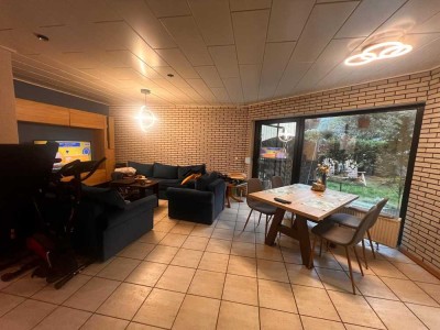 In Mainz-Laubenheim: Gepflegte Gartenwohnung mit drei Zimmern und Garagen