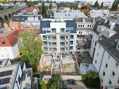 Heller Erstbezug | Hofseitige 2-Zimmerwohnung mit Balkon | Luftwärmepumpe | nähe Liesing &amp; Riverside | Fertigstellung 1Q2026