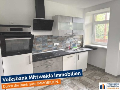 Ehemaliges Wohn- und Geschäftshaus im Zentrum der Stadt