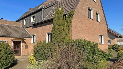 Zweifamilienhaus in Voerde-Stockum: Großzügiges Grundstück und attraktive Investitionsmöglichkeit!