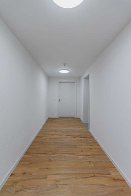 NEUBAU-ERSTBEZUG: ALTERS- / BEHINDERTENGERCHTES WOHNEN MIT TOLLER AUSSTATTUNG, TERRASSE & STELLPLATZ