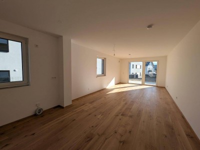 Bezugsfertig - ansprechende 3 Zimmer Erstbezugs-Gartenwohnung im Ortszentrum Hallwang!