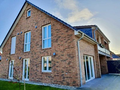 Freundliche 3-Zimmer-Terrassenwohnung mit Garten und Einbauküche in Winsen