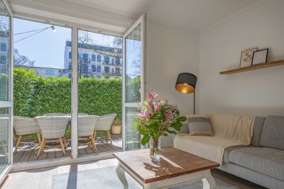 Möblierte Gartenwohnung mitten in der Stadt!