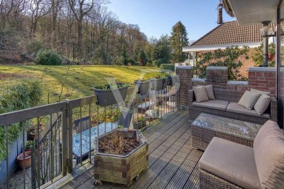 Attraktive Eigentumswohnung - Haus im Haus in begehrter Lage mit Garten & Waldzugang