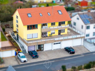 Top gepflegtes Mehrfamilienhaus mit vielseitiger Gewerbeeinheit