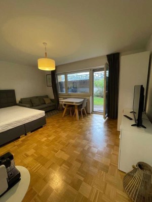 Stilvoll möblierte 1-Zimmer-Wohnung mit Gartenterrasse und separater Küche