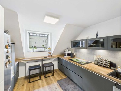 Exklusives Wohngefühl über Gelsenkirchen: Moderne Dachgeschosswohnung mit Stil