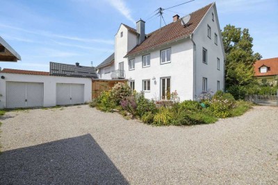 *RESERVIERT* Zentral gelegene, modernisierte Bauernhaushälfte mit Südgarten und Ausbaupotenzial