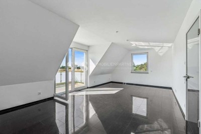 Wohnen mit Weitblick: Helle Etagenwohnung mit Aufzug, großem Balkon, Feldpanorama und Stellplatz