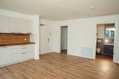 3-Zimmer I 63m² I Neubau Erstbezug I Balkon, Einbauküche & Bad mit Möbel + Regendusche