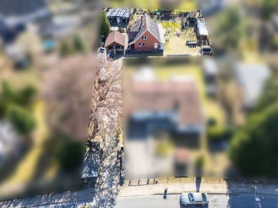 Einfamilienhaus mit neben Gelass auf einem 1.597m² großem Grundstück