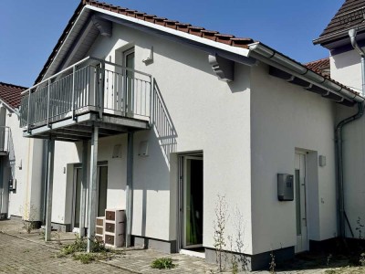 Reihenmittelhaus mit Balkon, 2 Stellplätzen – kein Garten, zentrale Lage