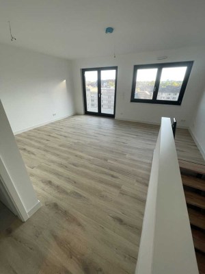 Wohnung mit Rheinblick! Helle Neubauwohnung mit Balkon nahe Zollhafen!