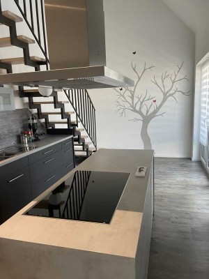 Neuwertige Wohnung mit zwei Zimmern sowie Balkon und Einbauküche in Maselheim