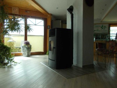 Freistehendes Holzhaus mit separater Einliegerwohnung