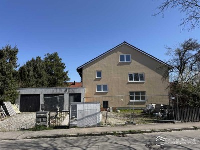 Mehrfamilienhause mit drei Wohnungen auf tollem Grundstück und Nebengebäude zu verkaufen